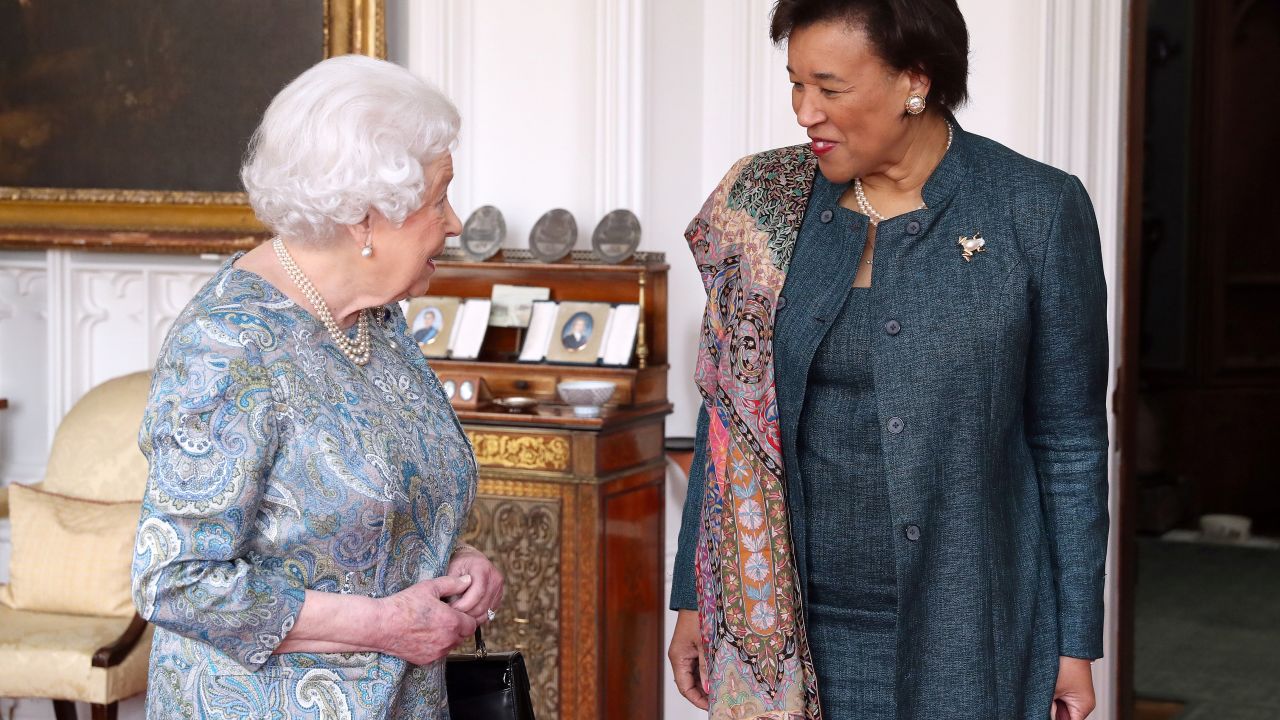 Britain's Queen Elizabeth II (L) receives Secretary-General of the Commonwealth, Patricia Scotland, during an audience in the Oak Room at Windsor Castle, in Windsor, west of London on April 11, 2018. / AFP PHOTO / POOL / Andrew Matthews        (Photo credit should read ANDREW MATTHEWS/AFP via Getty Images)