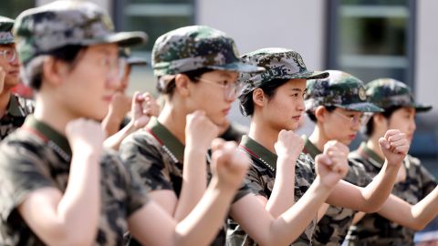 Newly recruited civil servants undergo military training at the Shizhong District People's Court in Zaozhuang, China, on Sept 3, 2022. 