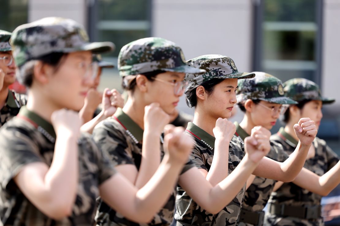 Newly recruited civil servants undergo military training at the Shizhong District People's Court in Zaozhuang, China, on Sept 3, 2022. 