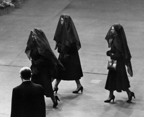 From left, the Queen Mother, Queen Elizabeth II and Princess Margaret attend the arrival of the King's coffin at Westminster Hall on February 11, 1952.