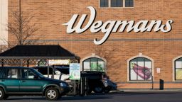 A logo sign outside of a Wegmans Food Markets grocery store in Frederick, Maryland, on January 22, 2019. (Photo by Kristoffer Tripplaar/Sipa USA)