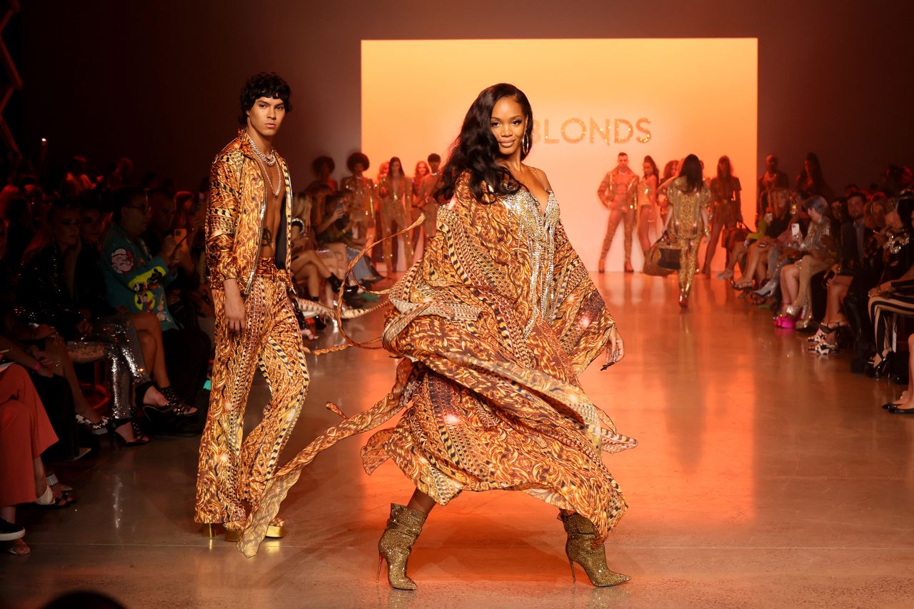 Warm metallics dominated The Blonds' glam-heavy ode to the 1970s, which was filled with fringed gowns, catsuits, plunging necklines and bellbottoms.