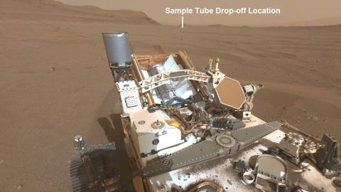 The rover scouts a potential site to dump a cache of samples.