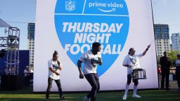 FILE - Robert "Bojo" Ackah, center, and Fik-Shun, left, perform during the announcement of the first Thursday Night Football on Prime Video matchup featuring the San Diego Chargers at Kansas City Chiefs at the 2022 NFL Draft on Thursday, April 28, 2022 in Las Vegas. The Thursday night, Sept. 15 game between the Los Angeles Chargers and Kansas City Chiefs kicks off Amazon Prime Video's 11-year agreement with the NFL to carry "Thursday Night Football". (AP Photo/Vera Nieuwenhuis, File)