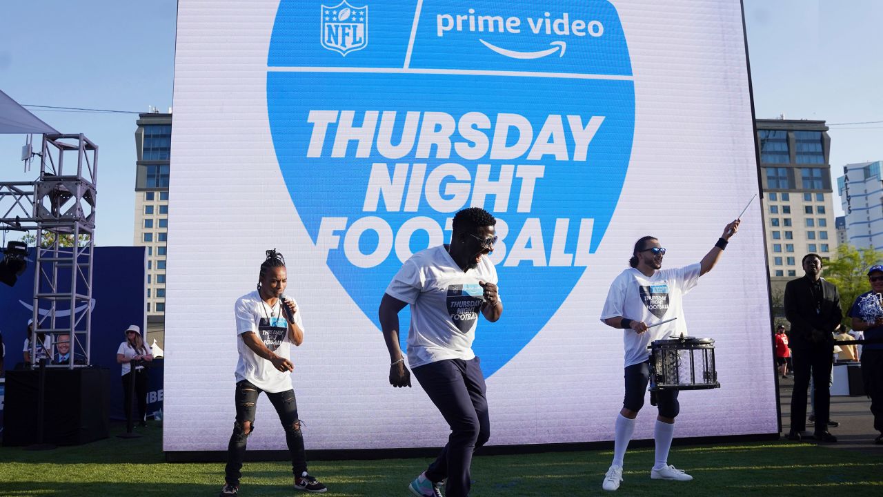 FILE - Robert "Bojo" Ackah, center, and Fik-Shun, left, perform during the announcement of the first Thursday Night Football on Prime Video matchup featuring the San Diego Chargers at Kansas City Chiefs at the 2022 NFL Draft on Thursday, April 28, 2022 in Las Vegas. The Thursday night, Sept. 15 game between the Los Angeles Chargers and Kansas City Chiefs kicks off Amazon Prime Video's 11-year agreement with the NFL to carry "Thursday Night Football". (AP Photo/Vera Nieuwenhuis, File)