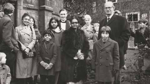 The writer's family outside a church in Cambridge, UK, after leaving Uganda in 1972. Lucy's grandmother Rachel, centre, wears a donated fur coat. 