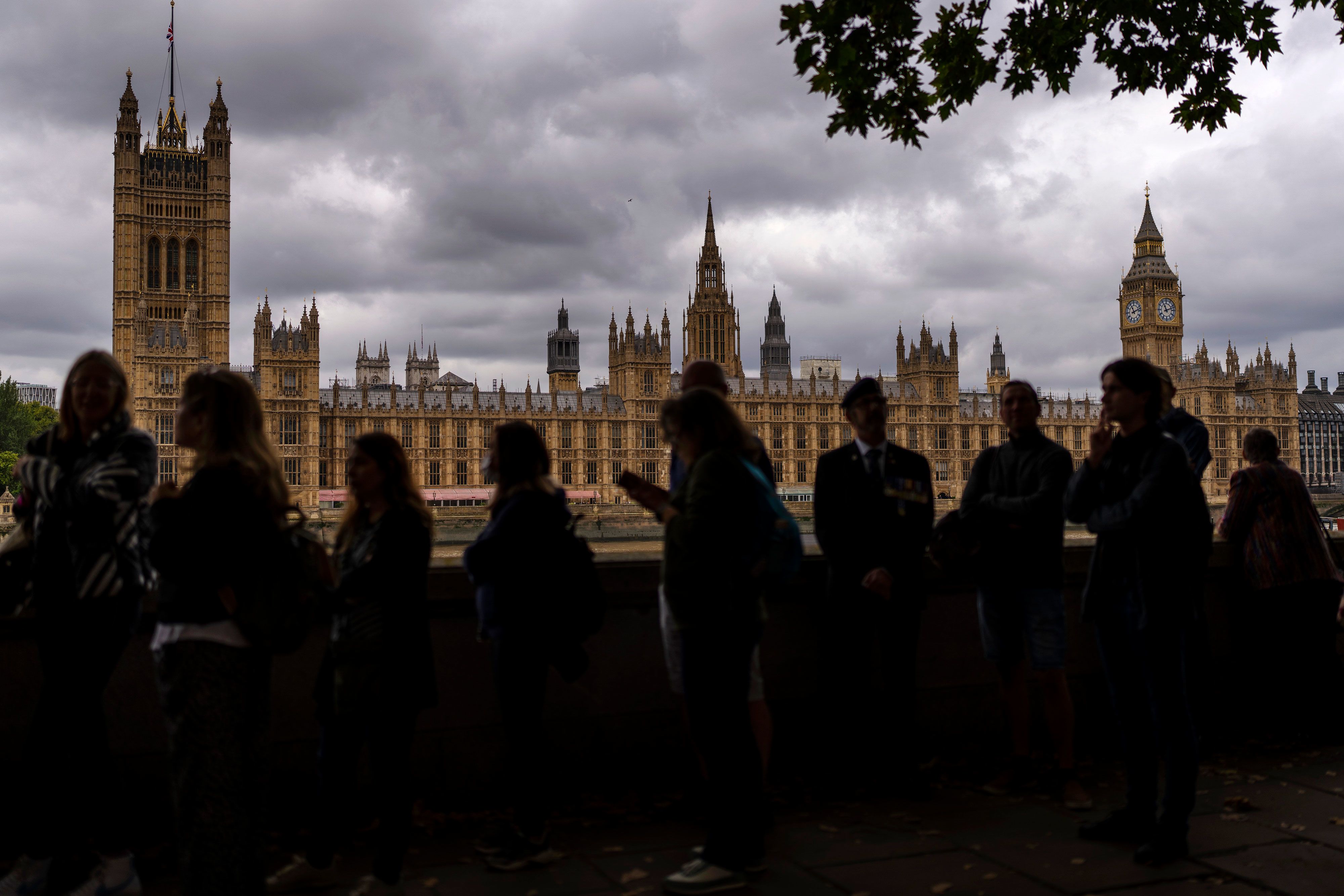 People in London wait in a long line Thursday, September 15, for the chance to pay their respects to Queen Elizabeth II.