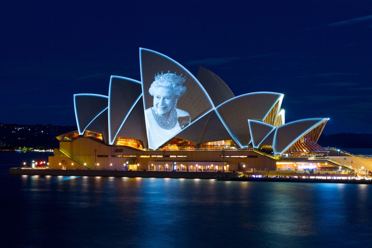 The Sydney Opera House in Australia is lit up with a picture of Britain's Queen Elizabeth II on Friday, September 9. <a href=