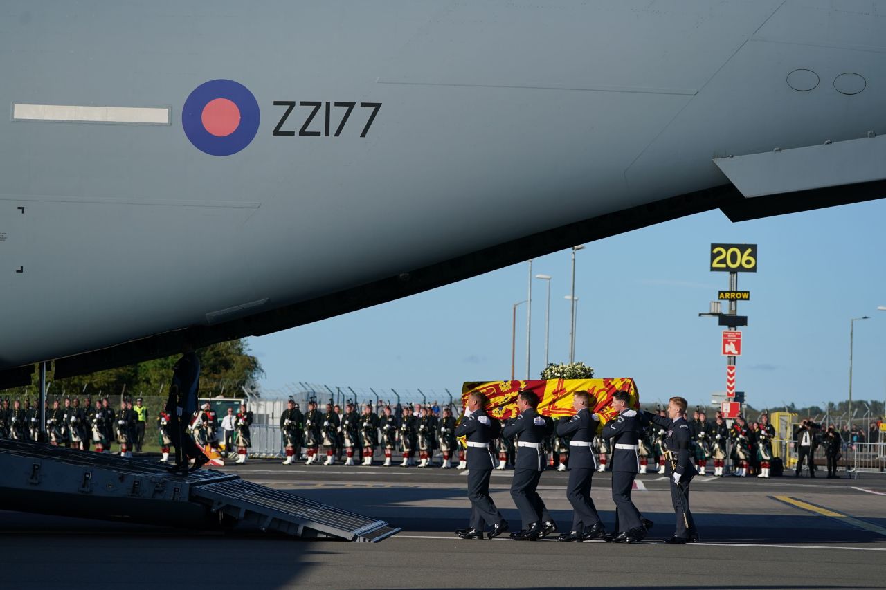 The coffin of Queen Elizabeth II is carried into a Royal Air Force plane in Scotland on Tuesday, September 13. The coffin was then flown to England.