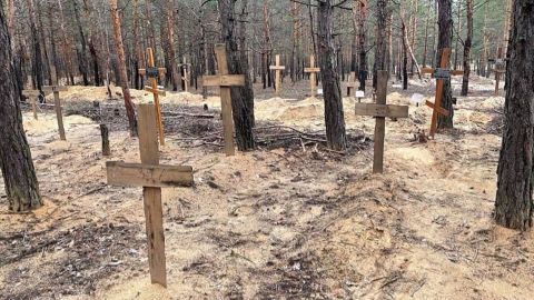 The mass burial site in Izyum, Ukraine is shown in a picture from the Office of the President of Ukraine.