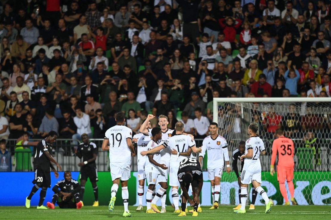 United's players celebrate Jadon Sancho's opening goal. 