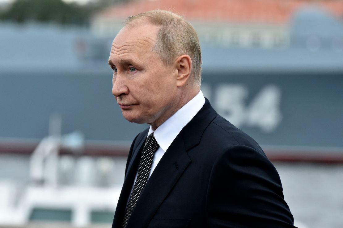 Russian President Vladimir Putin, here taking part in a naval parade in St. Petersburg in July, has said Russia is in "no hurry" to achieve its goals in Ukraine.