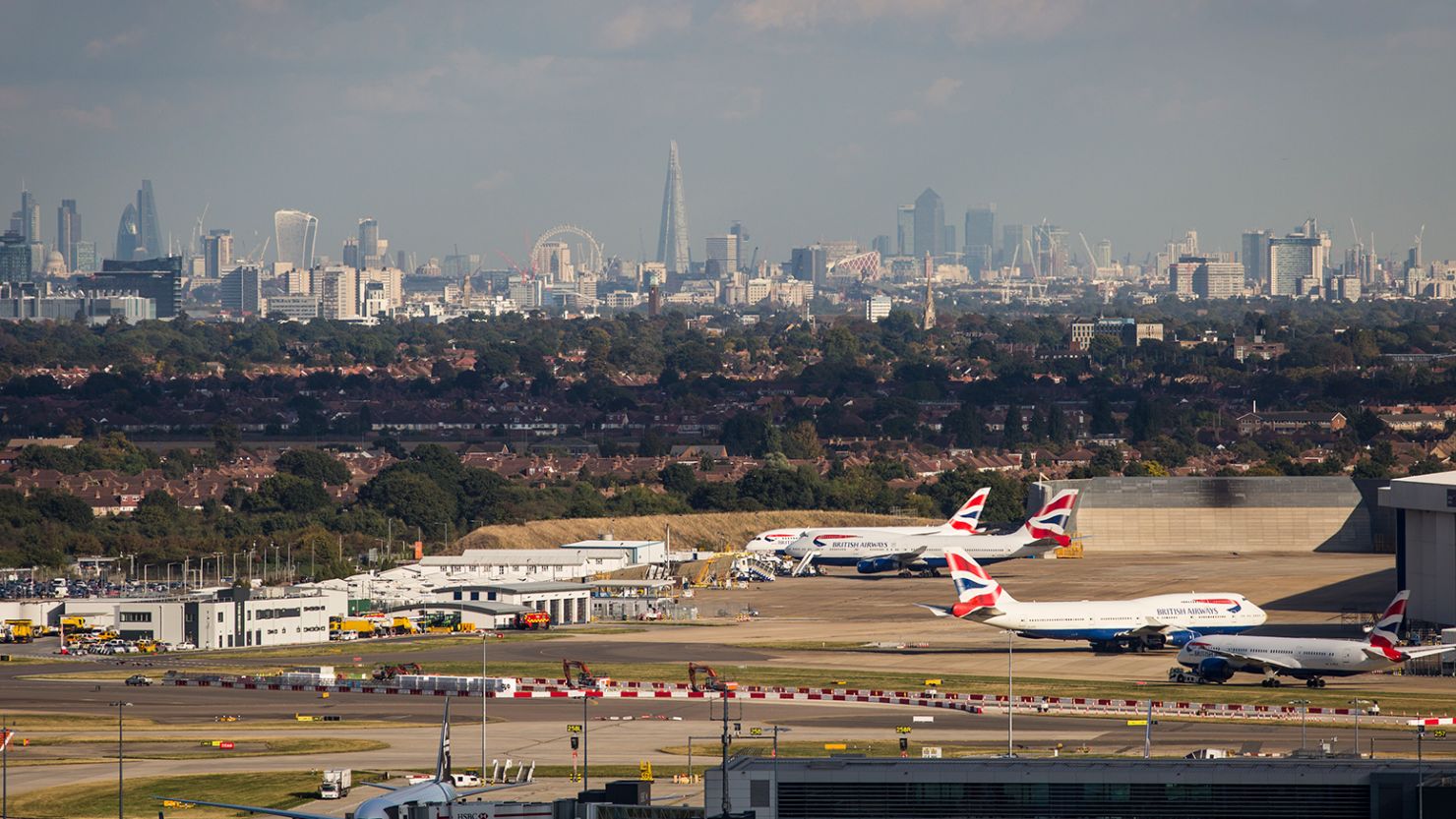 A general view of aircraft at Heathrow Airport in front of the London skyline on October 11, 2016 in London, England.