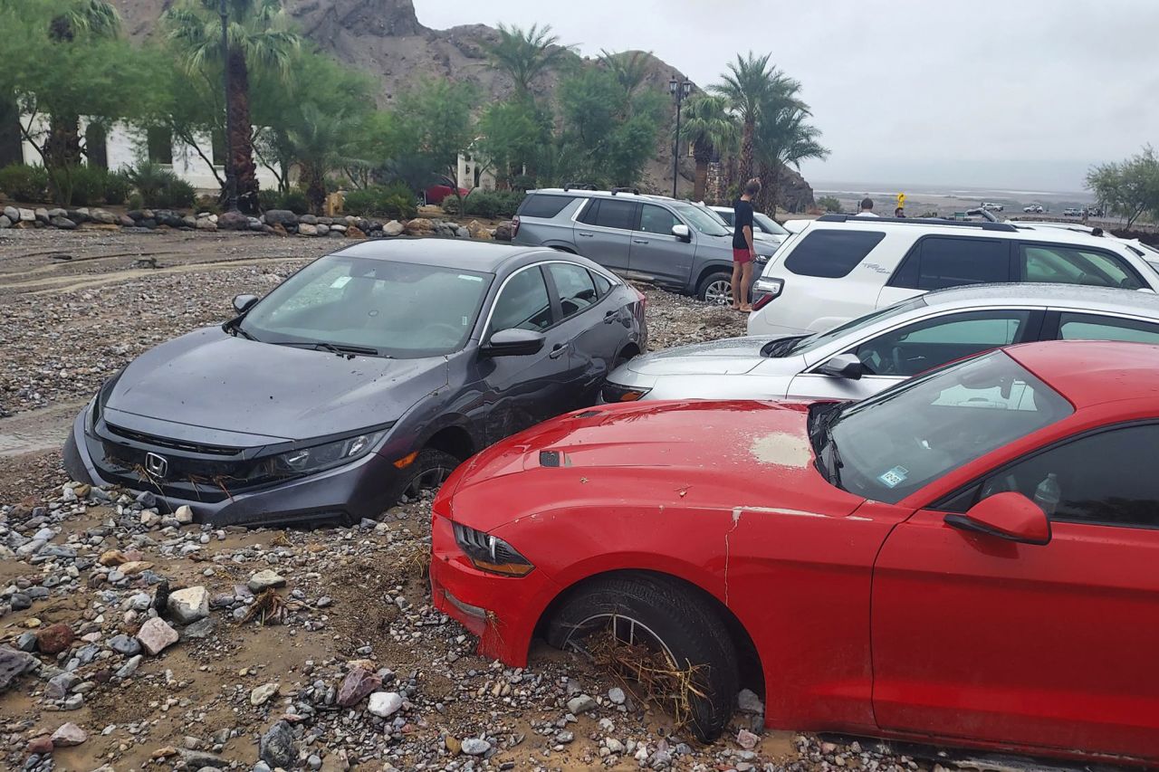 Just a little water can cause a lot of damage in the desert. Here, cars are stuck in mud and debris from flash flooding at The Inn at Death Valley in Death Valley National Park on August 5.
