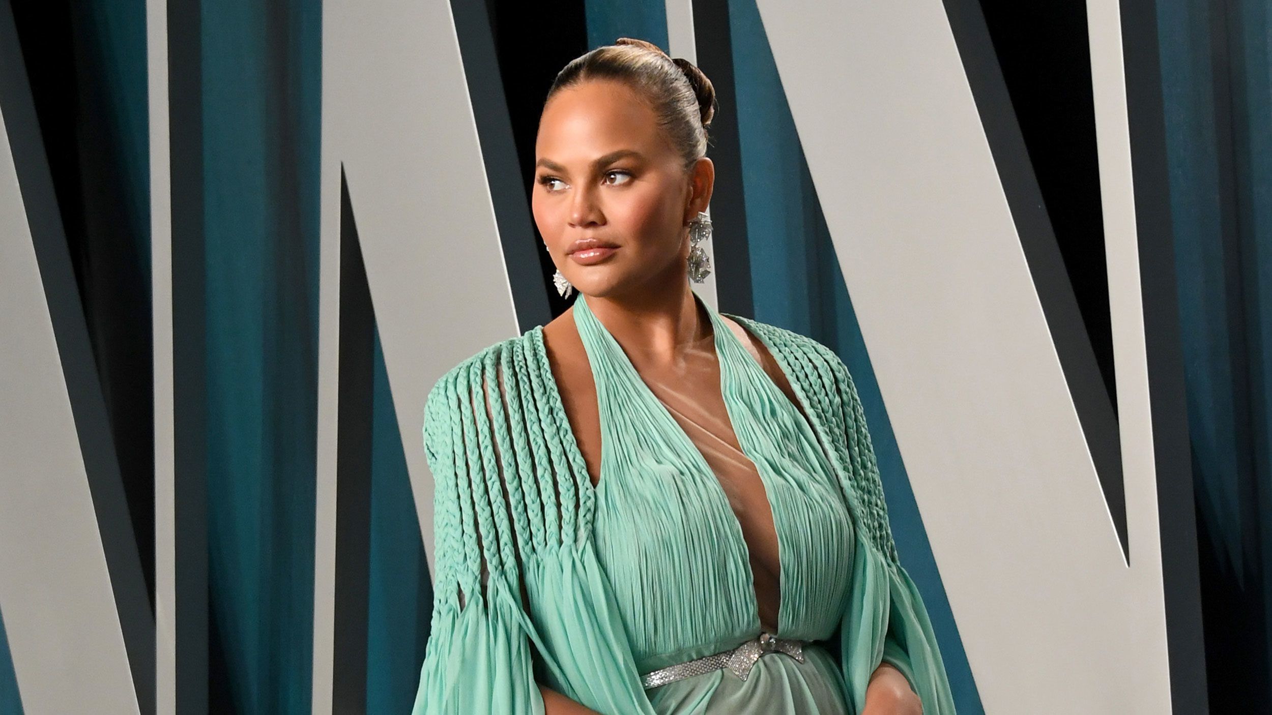 Chrissy Teigen says she's come to understand her miscarriage was actually  an abortion that saved her life