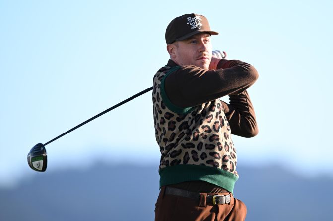 <strong>Macklemore:</strong> Taking his audacious style from the Thrift Shop to the fairways, the Grammy-award winning rapper is a keen player with his very own golf clothing line, Bogey Boys. Last year, he spoke with CNN about his <a href="index.php?page=&url=https%3A%2F%2Fwww.cnn.com%2Fvideos%2Fsports%2F2021%2F05%2F28%2Fmacklemore-golf-obsession-bogey-boys-living-golf-spt-intl-spc.cnn" target="_blank">"scary addiction"</a> to the game.