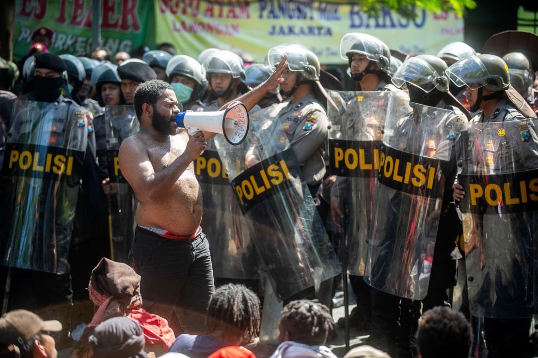 Papuan students take part in an anti-government protest in Surabaya on July 1, 2019. - A low-level insurgency has simmered for decades in resource-rich Papua, with Jakarta keeping a tight grip on the region through a heavy military and police presence.