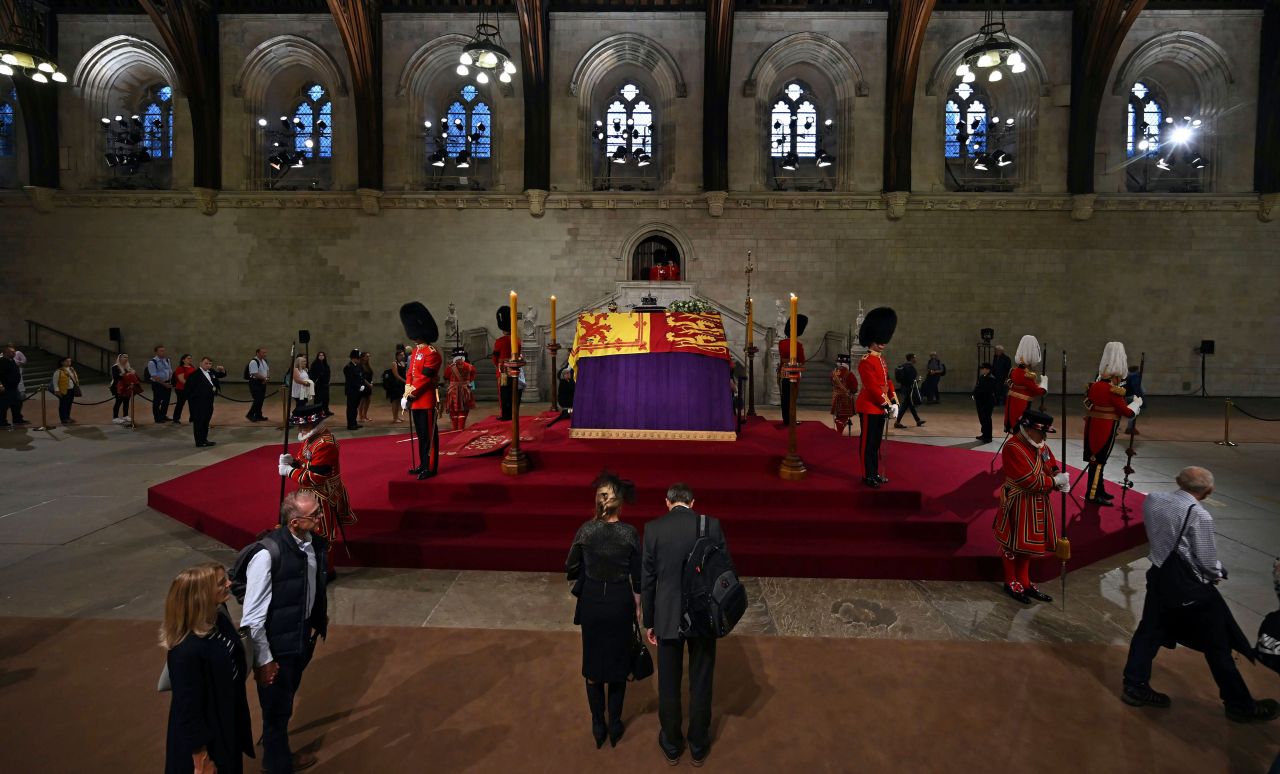 Members of the public view the Queen's coffin on Thursday.