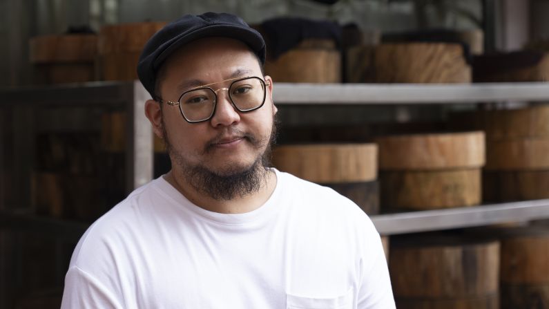 Mark Au, pictured, is the grandson of the store's founder, Man Au. Mark grew up in Yau Ma Tei and says the community talks more now about the importance of heritage, and tries to celebrate it. He feels that by commissioning the work of local craftsmen, the Hamilton Street Park pays tribute to that.