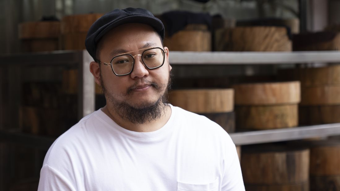 Mark Au, pictured, is the grandson of the store's founder, Man Au. Mark grew up in Yau Ma Tei and says the community talks more now about the importance of heritage, and tries to celebrate it. He feels that by commissioning the work of local craftsmen, the Hamilton Street Park pays tribute to that.
