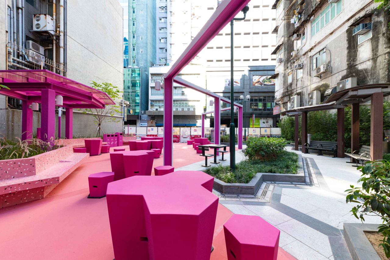 The design for Portland Street Rest Garden is now divided in two, showcasing the old, restored style and the new, modern pink design.