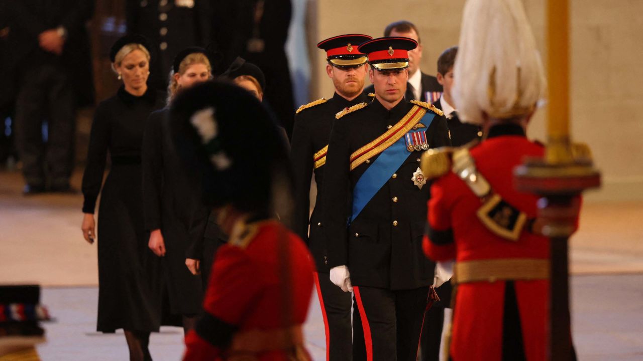 Prince William and the Queen's other grandchildren arrive to mount a vigil on Saturday. 