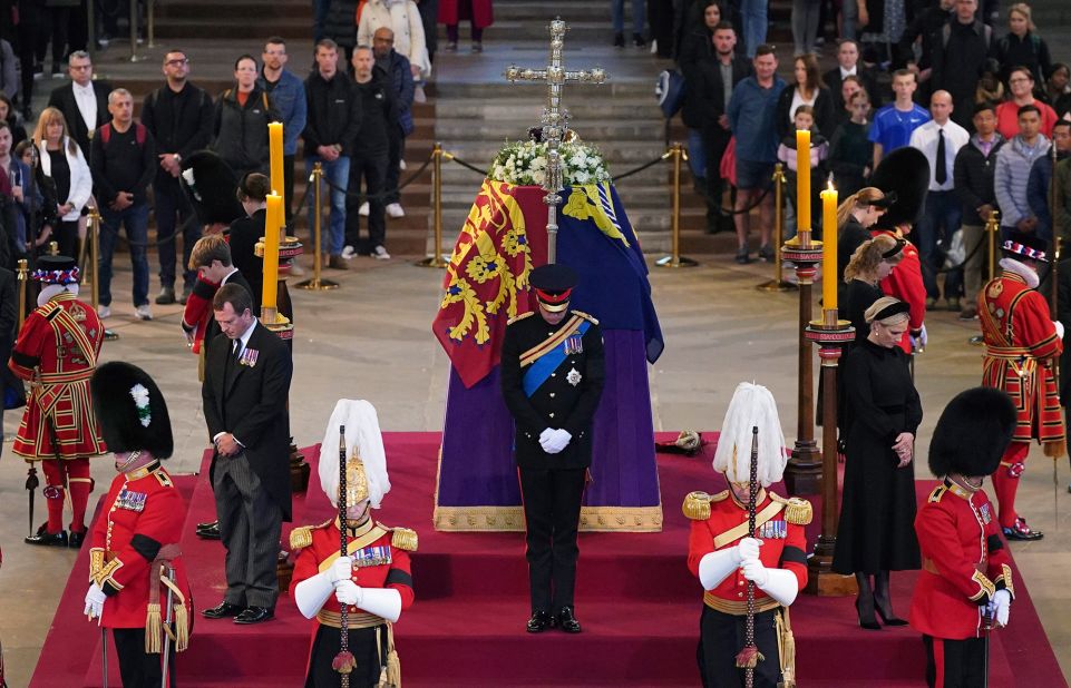 The Queen's grandchildren stand vigil inside Westminster Hall on Saturday.