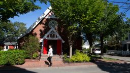 A man walks past St. Andrew's Episcopal Church in Edgartown, Martha's Vineyard, on Saturday, September 17. 