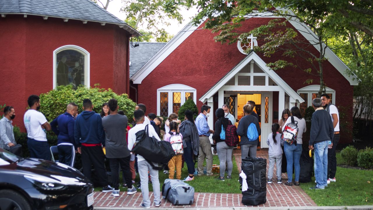 The migrants gather outside the church on Wednesday, the day they arrived on Martha's Vineyard. Juan Ramirez said he and the other migrants "came upon kindhearted people who have supported us with everything we need."