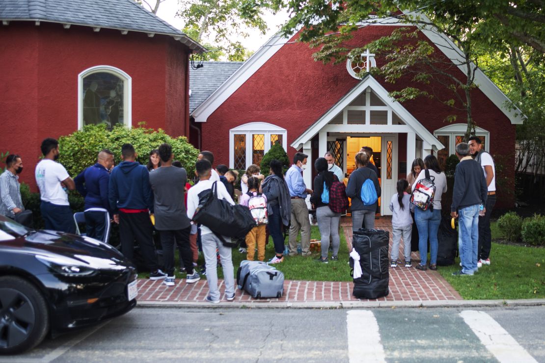 The migrants gather outside the church on Wednesday, the day they arrived on Martha's Vineyard. Juan Ramirez said he and the other migrants "came upon kindhearted people who have supported us with everything we need."