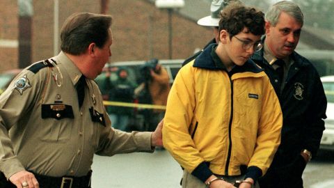 Authorities escorted Michael Garnier for arraignment in January 1998.