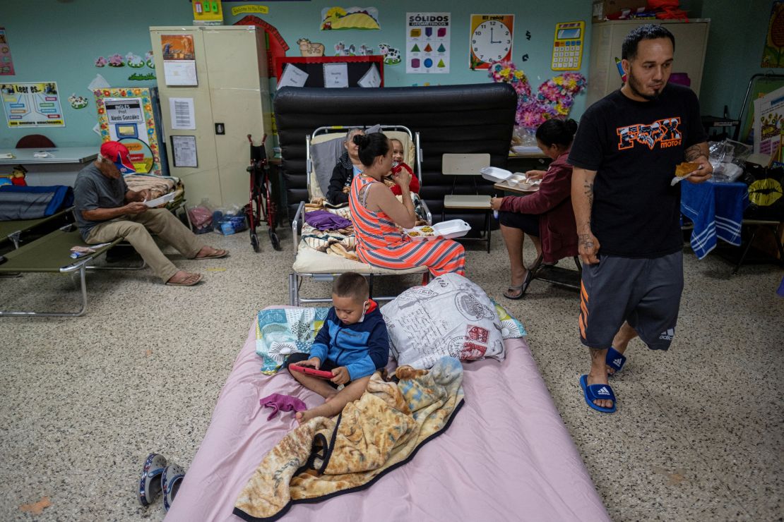 Hurricane evacuees take refuge at a public school in Guayanilla, Puerto Rico.