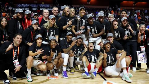 The Las Vegas Aces celebrate with the trophy after defeating the Connecticut Sun 78-71 in game four to win the 2022 WNBA Finals at Mohegan Sun Arena on September 18, 2022 in Uncasville, Connecticut. 