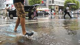 A street inundated by a heavy rain in Tokyo on Sept. 18, 2022.