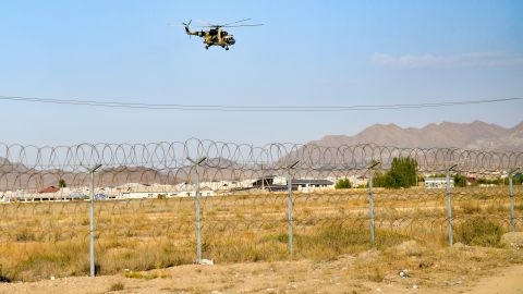 A military helicopter flies over the Kyrgyz-Tajik border near Batken, southwestern Kyrgyzstan on Saturday. 
