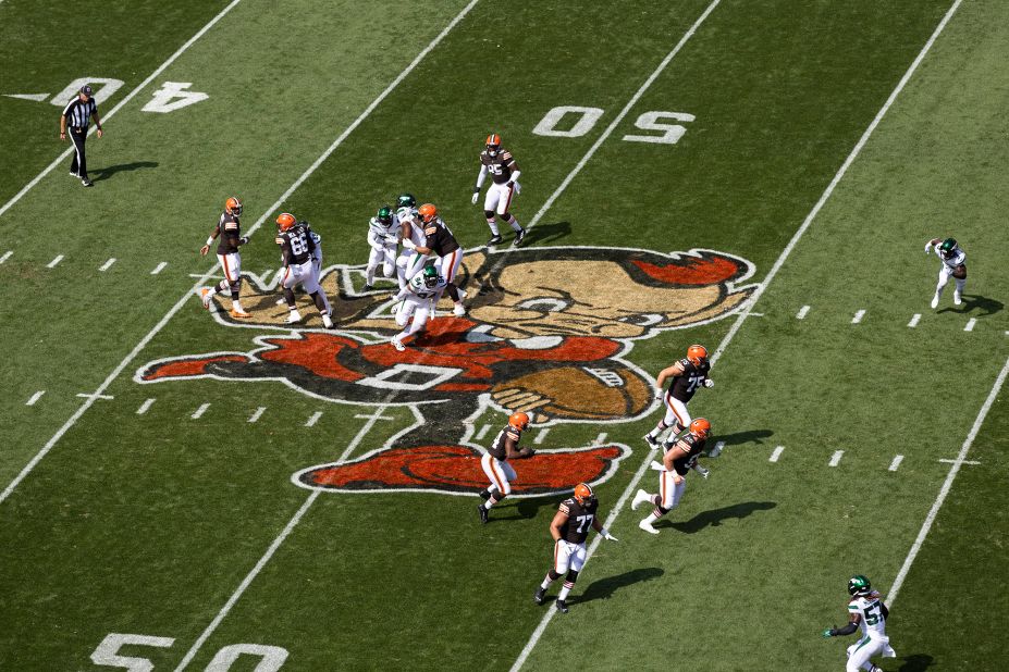 The Cleveland Browns run the ball across midfield against the New York Jets during the first quarter at FirstEnergy Stadium. The Browns ended up losing 31-30 after being up by 13 points with 1:55 remaining in the game. Jets QB Joe Flacco threw for 307 yards and four TDs — including two in the final two minutes of the game — to carry the Jets. Sunday's game saw the return of "Brownie the Elf" to the Browns' home field. The logo was initially used by the Browns in their inaugural season in 1946 but fell out of favor in the 60s, returning when the franchise was brought back to Cleveland in 1999.
