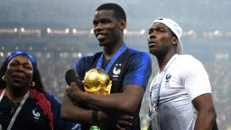 MOSCOW, RUSSIA - JULY 15:  Paul Pogba of France (c) celebrates victory with mother Yeo and brother Mathias during the 2018 FIFA World Cup Final between France and Croatia at Luzhniki Stadium on July 15, 2018 in Moscow, Russia.  (Photo by Shaun Botterill/Getty Images)