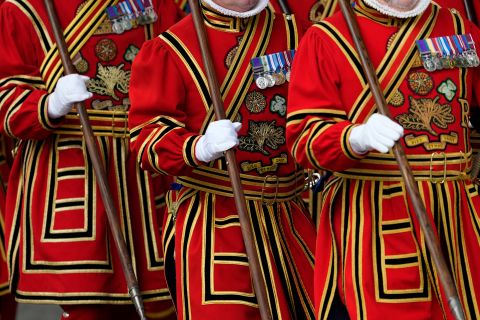 Yeoman of the Guard arrive before the Queen's coffin was carried into Westminster Abbey.