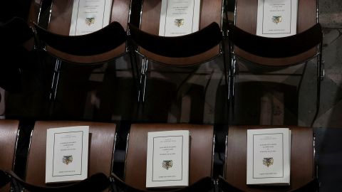 Funeral programs placed on chairs in Westminster Abbey.