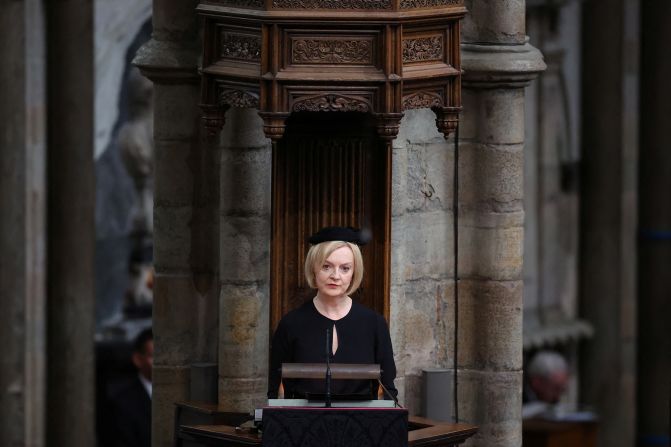 British Prime Minister Liz Truss speaks during the funeral service. Truss, who has been prime minister for less than two weeks, <a href="index.php?page=&url=https%3A%2F%2Fwww.cnn.com%2Fuk%2Flive-news%2Ffuneral-queen-elizabeth-intl-gbr%2Fh_635b56605100999e16165fb7ecfea8ad" target="_blank">read from the Gospel of John.</a>