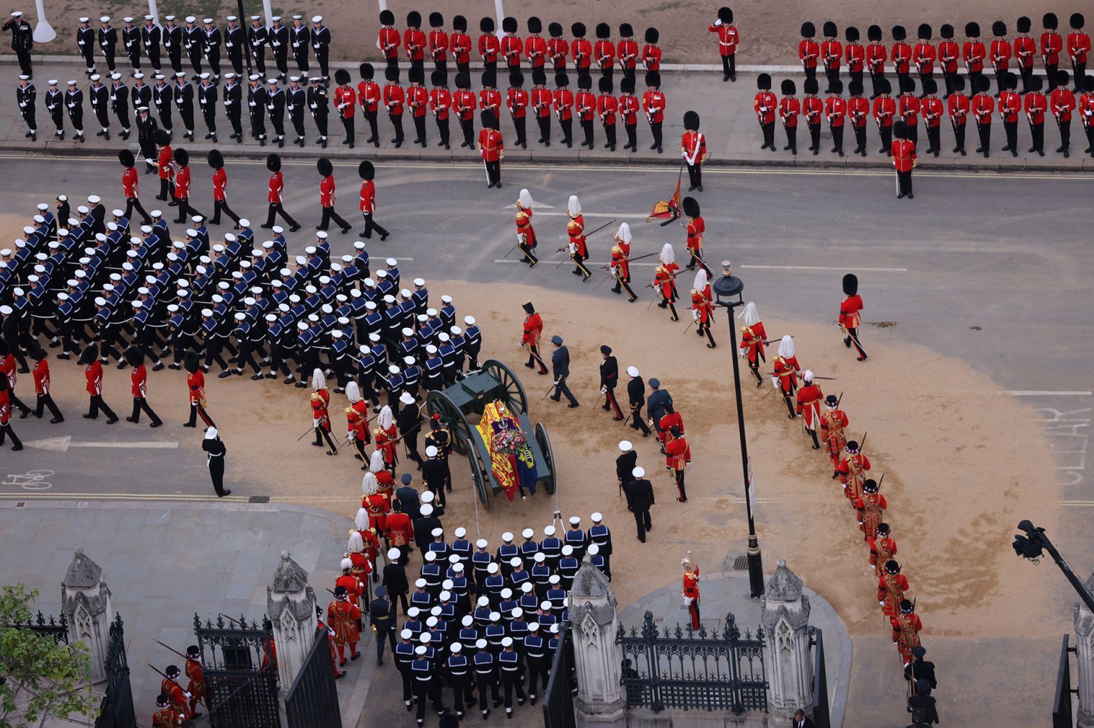 Members of the British Armed Forces march during the funeral procession.