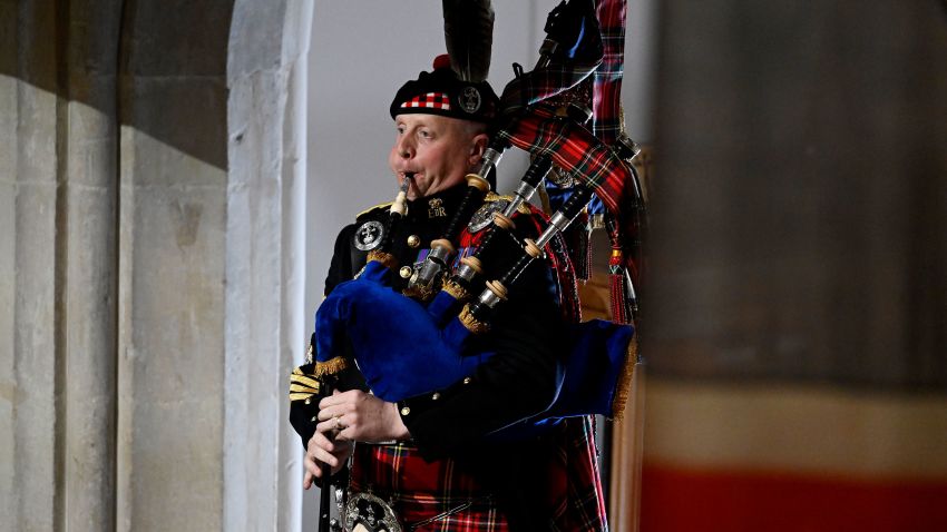 LONDON, ENGLAND - SEPTEMBER 19: Pipe Major Paul Burns of the Royal Regiment of Scotland helps to close Queen Elizabeth II state funeral with a rendition of the traditional piece Sleep, Dearie, Sleep at Westminster Abbey on September 19, 2022 in London, England. Elizabeth Alexandra Mary Windsor was born in Bruton Street, Mayfair, London on 21 April 1926. She married Prince Philip in 1947 and ascended the throne of the United Kingdom and Commonwealth on 6 February 1952 after the death of her Father, King George VI. Queen Elizabeth II died at Balmoral Castle in Scotland on September 8, 2022, and is succeeded by her eldest son, King Charles III.  (Photo by Gareth Cattermole/Getty Images)