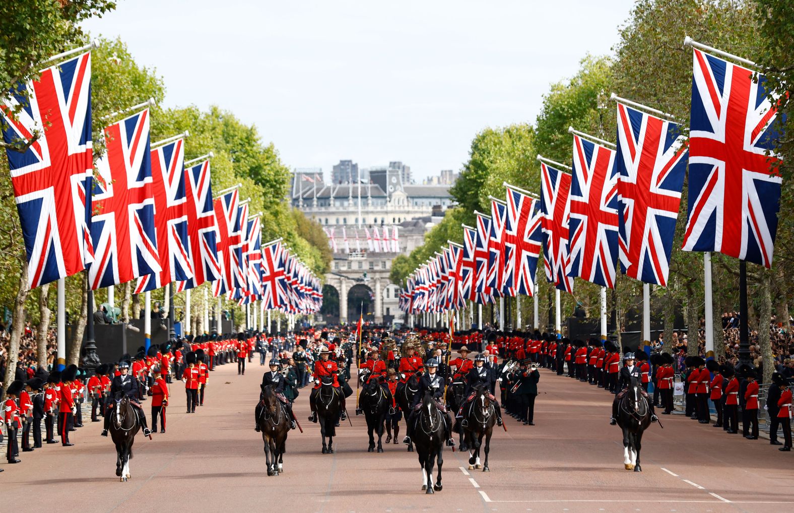 The Queen's funeral procession marches down The Mall after the service at Westminster Abbey.