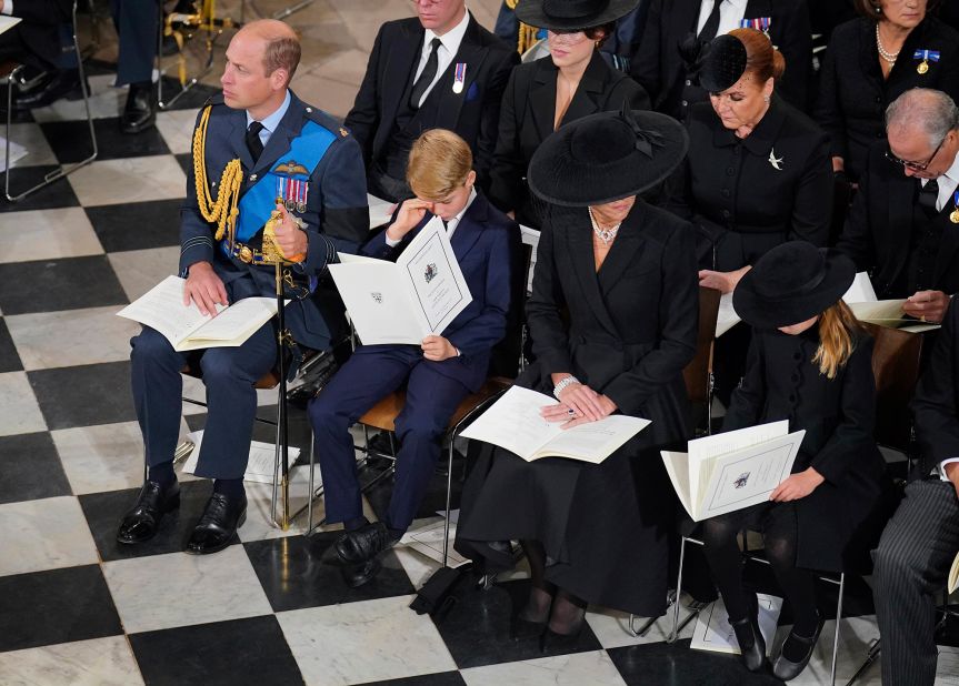 From left, Prince William; Prince George; Catherine, the Princess of Wales; and Princess Charlotte attend the funeral service.