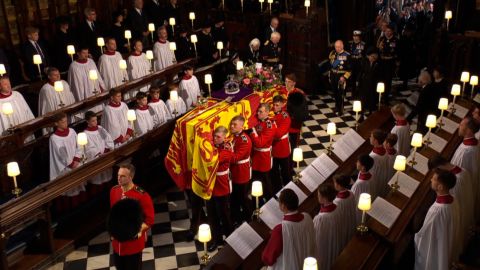 The Queen's coffin is carried into St. George's Chapel.