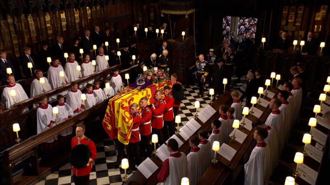 The Queen's coffin is carried into St. George's Chapel.