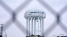 FILE - The Flint water plant tower is seen on Jan. 6, 2022, in Flint, Mich. A judge declared a mistrial Thursday, Aug. 11, after jurors said they couldn't reach a verdict in a dispute over whether two engineering firms should bear some responsibility for Flint's lead-contaminated water. Four families accused Veolia North America and Lockwood, Andrews & Newman, known as LAN, of not doing enough to get Flint to treat the highly corrosive water or to urge a return to a regional water supplier. (AP Photo/Carlos Osorio, File)