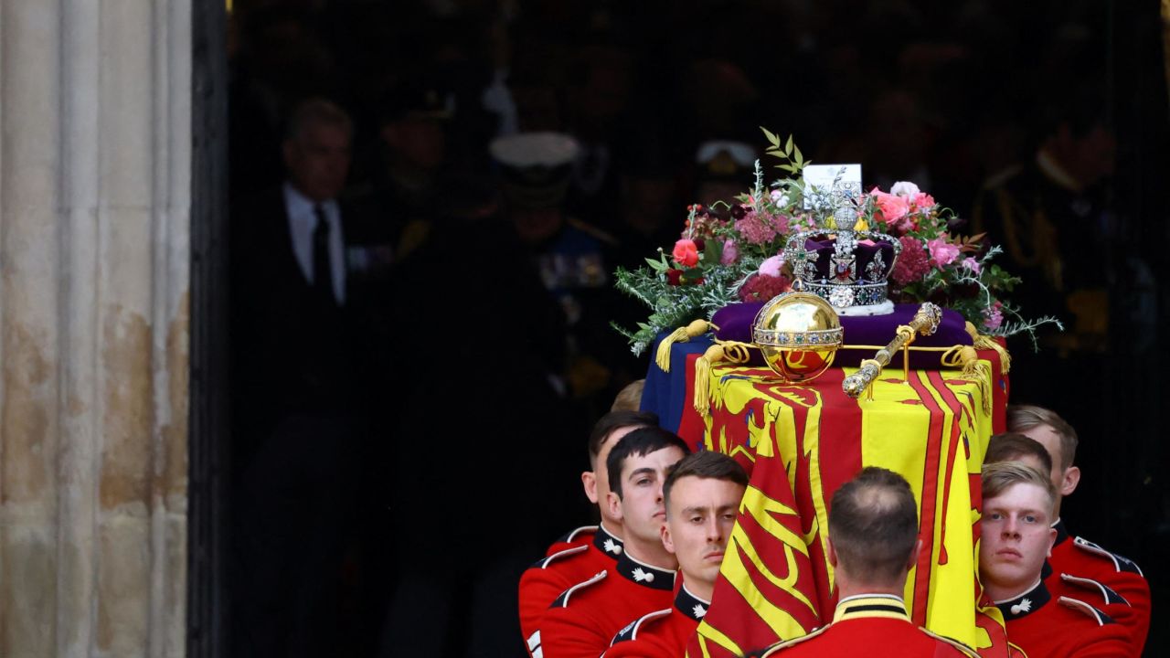 LONDON, ENGLAND - SEPTEMBER 19: The coffin is carried out by pallbearers after the State Funeral of Queen Elizabeth II at Westminster Abbey on September 19, 2022 in London, England.  Elizabeth Alexandra Mary Windsor was born in Bruton Street, Mayfair, London on 21 April 1926. She married Prince Philip in 1947 and ascended the throne of the United Kingdom and Commonwealth on 6 February 1952 after the death of her Father, King George VI. Queen Elizabeth II died at Balmoral Castle in Scotland on September 8, 2022, and is succeeded by her eldest son, King Charles III. (Photo by Hannah McKay - WPA Pool/Getty Images)