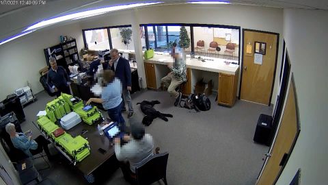Newly obtained surveillance video shows a Republican county official and a team of operatives working with Trump 2020 attorney Sidney Powell inside a restricted area of the elections office in Coffee County Georgia. Portions of this image were obscured to protect the identity of people unnamed in the report. 