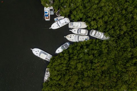 Boats sit secured to mangroves as Fiona approaches Cabo Rojo, Puerto Rico, on Saturday.